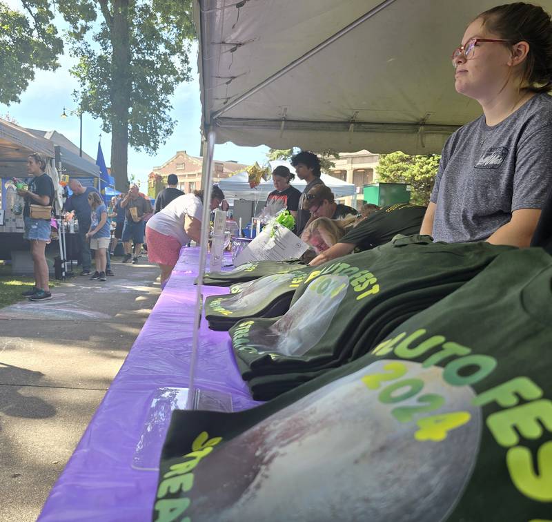 Pluto Fest 2024 T-shirts were sold Saturday, Sept. 14, 2024, during the annual Pluto Festival that featured a number of craft vendors in Streator's City Park.