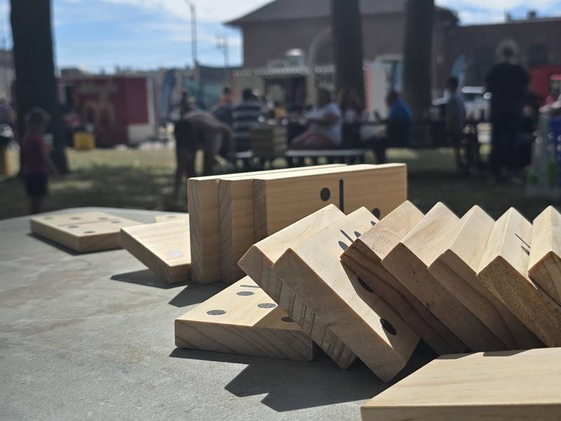 Dominoes were one of many games set up Saturday, Sept. 14, 2024, in the picnic area of Streator's City Park during the Fall Food Truck Festival and Pluto Festival.