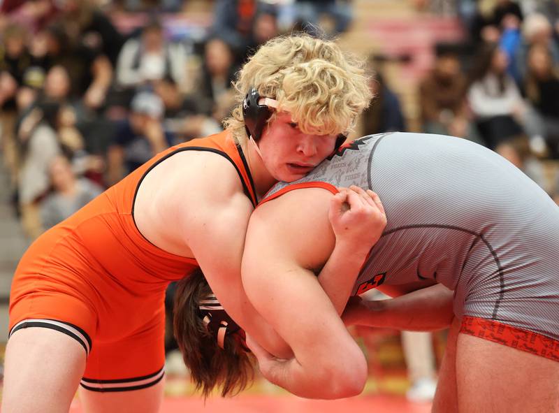 Minooka's Hunter Coons wrestles Yorkville's Hunter Janeczko, in grey, during the Southwest Prairie Conference wrestling meet at Yorkville High School on Saturday, Jan. 21, 2023.