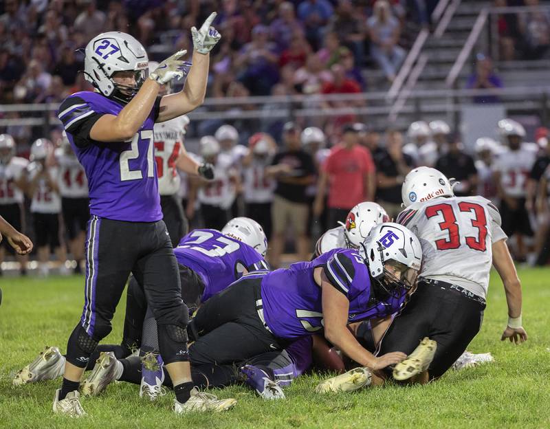 Dixon’s Eli Davison celebrates a fumble recovery against Stillman Valley Friday, Aug. 30, 2024 at Dixon High School.