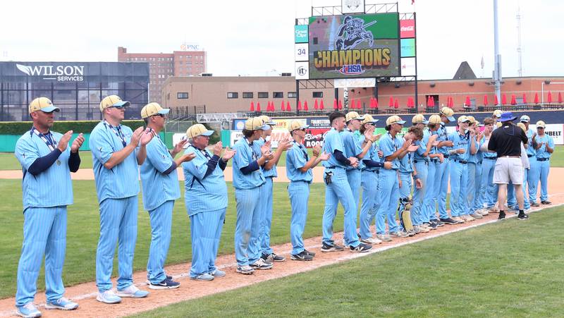 Members of the Marquette baseball team receive their Class 1A championship medals after defeating Altamont 6-2 to win the Class 1A championship on Saturday, June 1, 2024 at Dozer Park in Peoria.