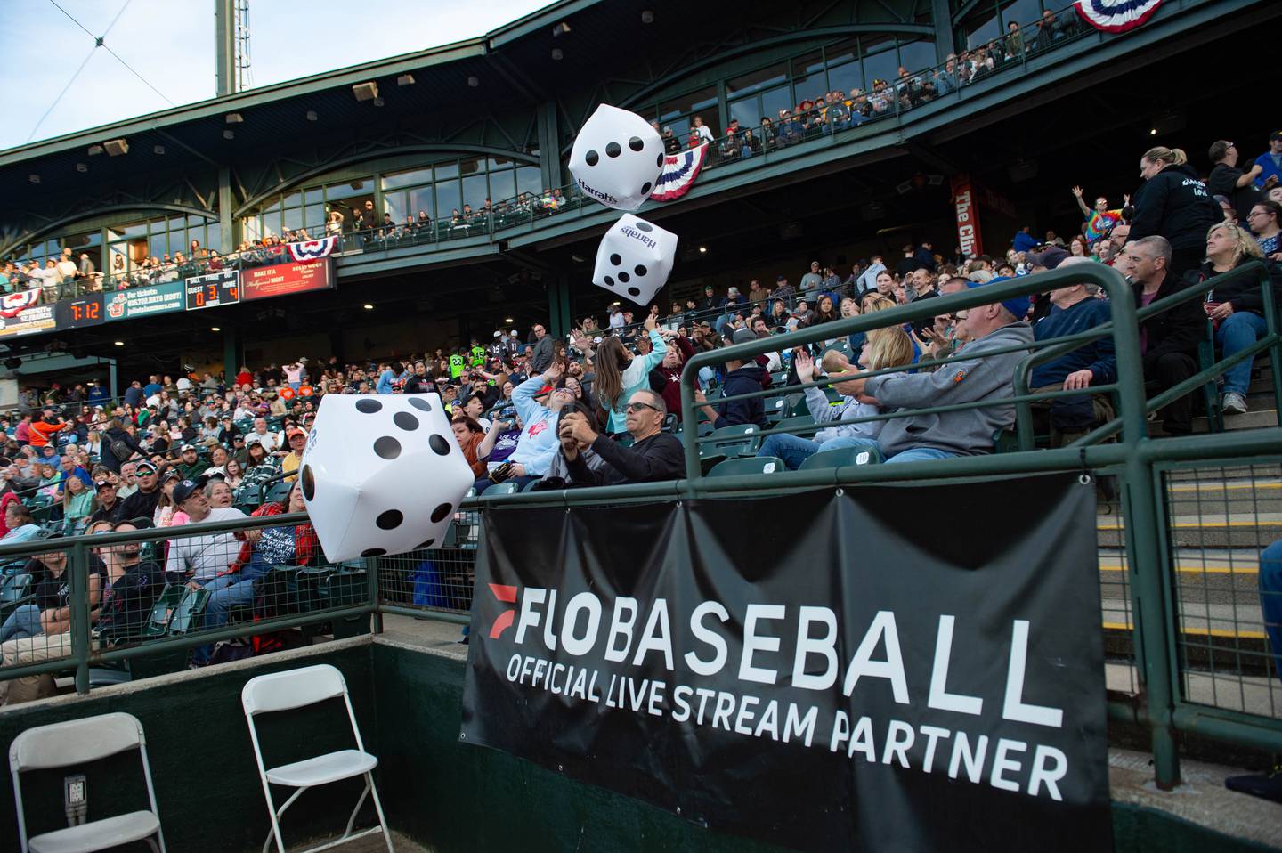 Fans enjoy the new Harrahs dice game promotion during the Joliet Slammers home opener Friday May 10, 2024 at Duly Health and Care Field in Joliet