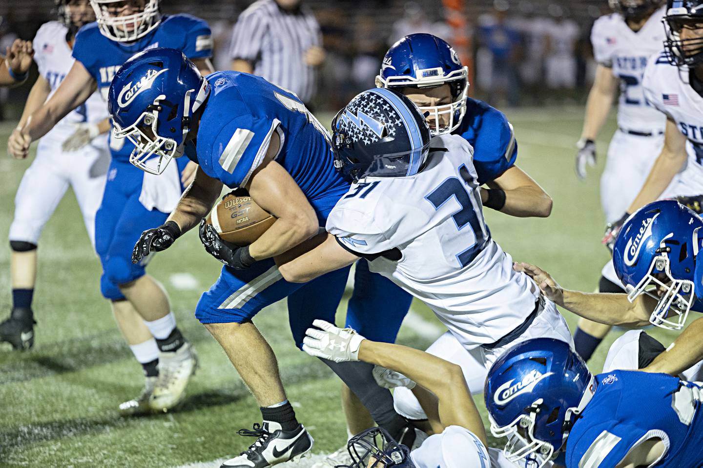 Newman’s Brady Grennan fights for yards against Bureau Valley Friday, Sept. 29, 2023 in Sterling.