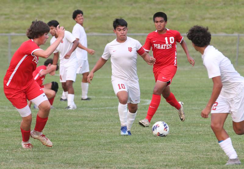 L-P's Ismael Mejia and Ottawa's Michael Bedolla look to advance the ball up the field during the game on Thursday, Sept. 5, 2024 at King Field.