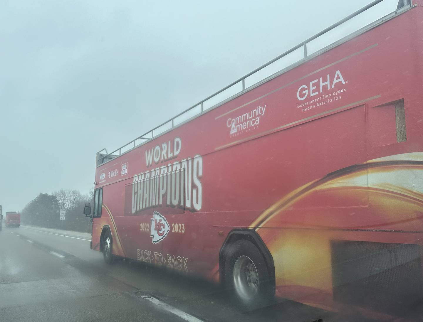 Eight Kansas City Chiefs double-decker buses travel Interstate 80 Eastbound on Friday, Feb. 16, 2024 in Bureau County. The busses came from all over the country to be in the Super Bowl parade.