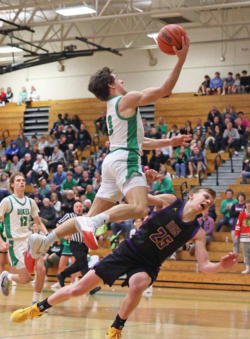 York’s AJ Levine (3) takes it to the basket against Downers Grove North during a boys varsity basketball game on Saturday, Feb. 10, 2024 in Elmhurst, IL.