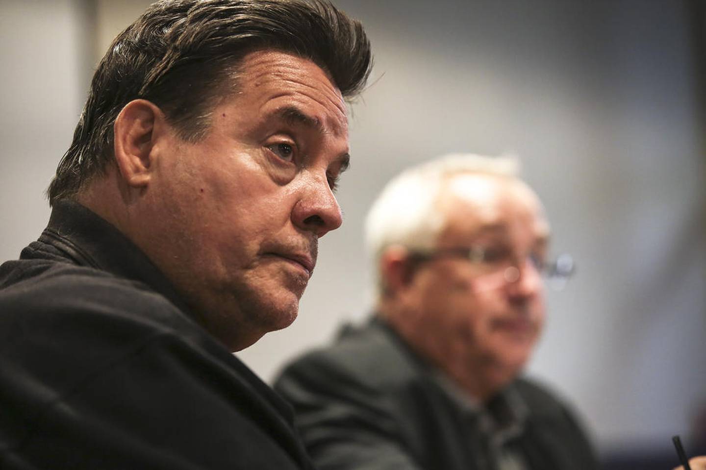 Will County Board members Steve Balich (left) and Mike Fricilone (right) field questions from local residents on Monday, Sept. 30, 2019, at Coom's Corner in Lockport, Ill. County Republicans held a community forum to answer questions about a pending gas tax.