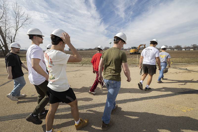 Building trades students from WACC attend a groundbreaking at one of two areas in Rock Falls poised for development Tuesday, Feb. 27, 2024. Classes from the career center will take part in the building of the homes.