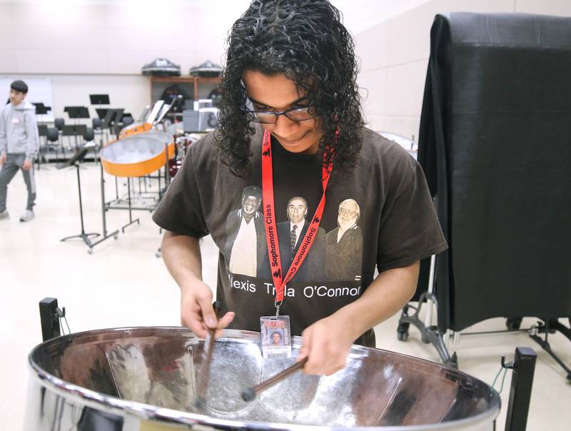 Jaden Teague-Núñez, 16, a sophomore at DeKalb High School, with the steelpan Monday, March 18, 2024, in the band room at the school. Teague-Núñez won first place in the Chicago Symphony Orchestra’s Young Artists Competition and will appear as a soloist in a CSO youth concert during the 2024-25 season.