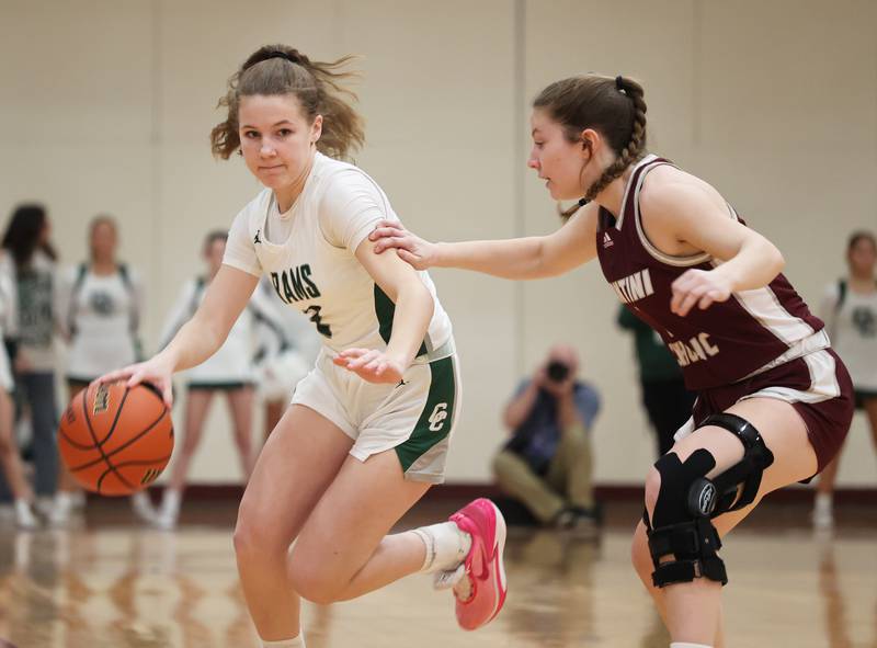 Grayslake Central’s Mosey Drevline tries to get past the Montini Catholic defense during the girls Class 3A Concordia University Supersectional basketball game on Monday, Feb. 26, 2024 in River Forest, IL.