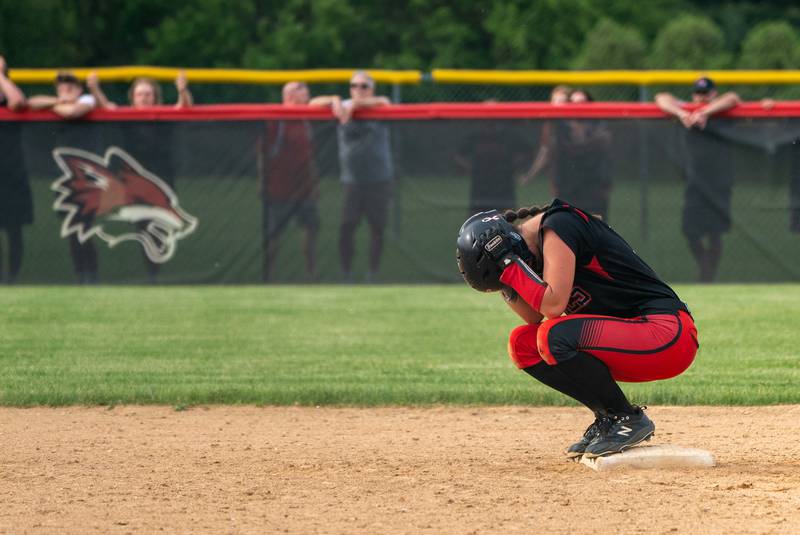 Yorkville's Ellie Alvarez (13) crouches down at second after a season ending loss to West Aurora during the Class 4A Yorkville Sectional semifinal at Yorkville High School on Tuesday, May 31, 2022.