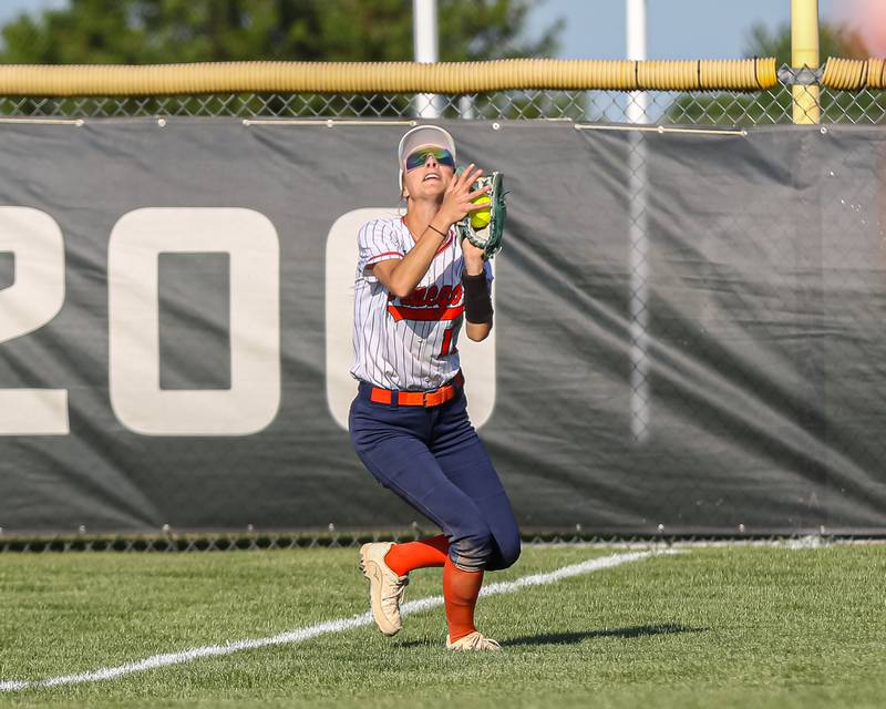 Oswego's Kaylee LaChappell (11) makes a catch in foul territory during Class 4A Plainfield North Sectional semifinal softball game between Wheaton-Warrenville South at Oswego. May 29th, 2024.