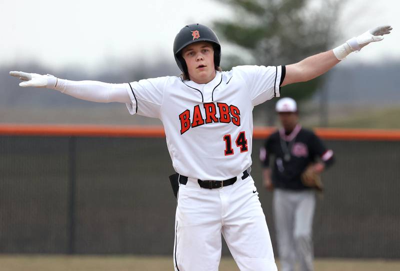 DeKalb’s Brodie Farrell celebrates after hitting a double during their game against East Aurora Wednesday, March 13, 2024, at DeKalb High School.