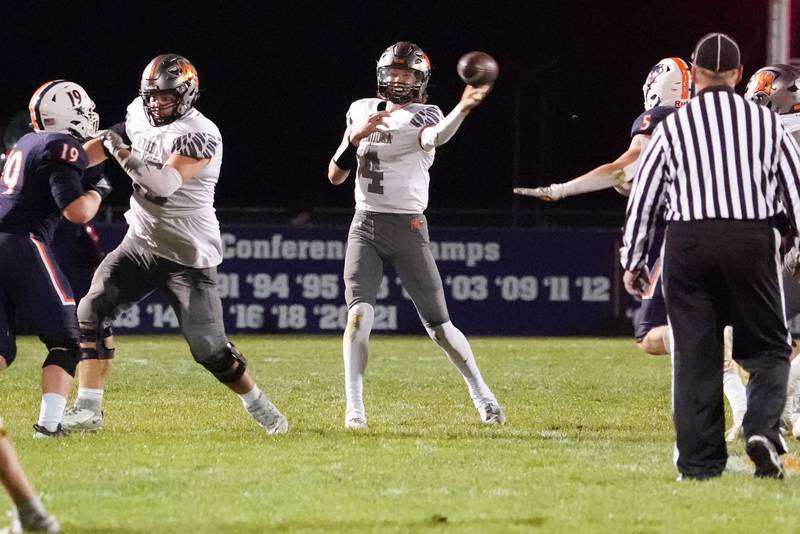 Minooka's Zane Caves (4) throws a pass against Oswego during a football game at Oswego High School on Friday, October 18, 2024.