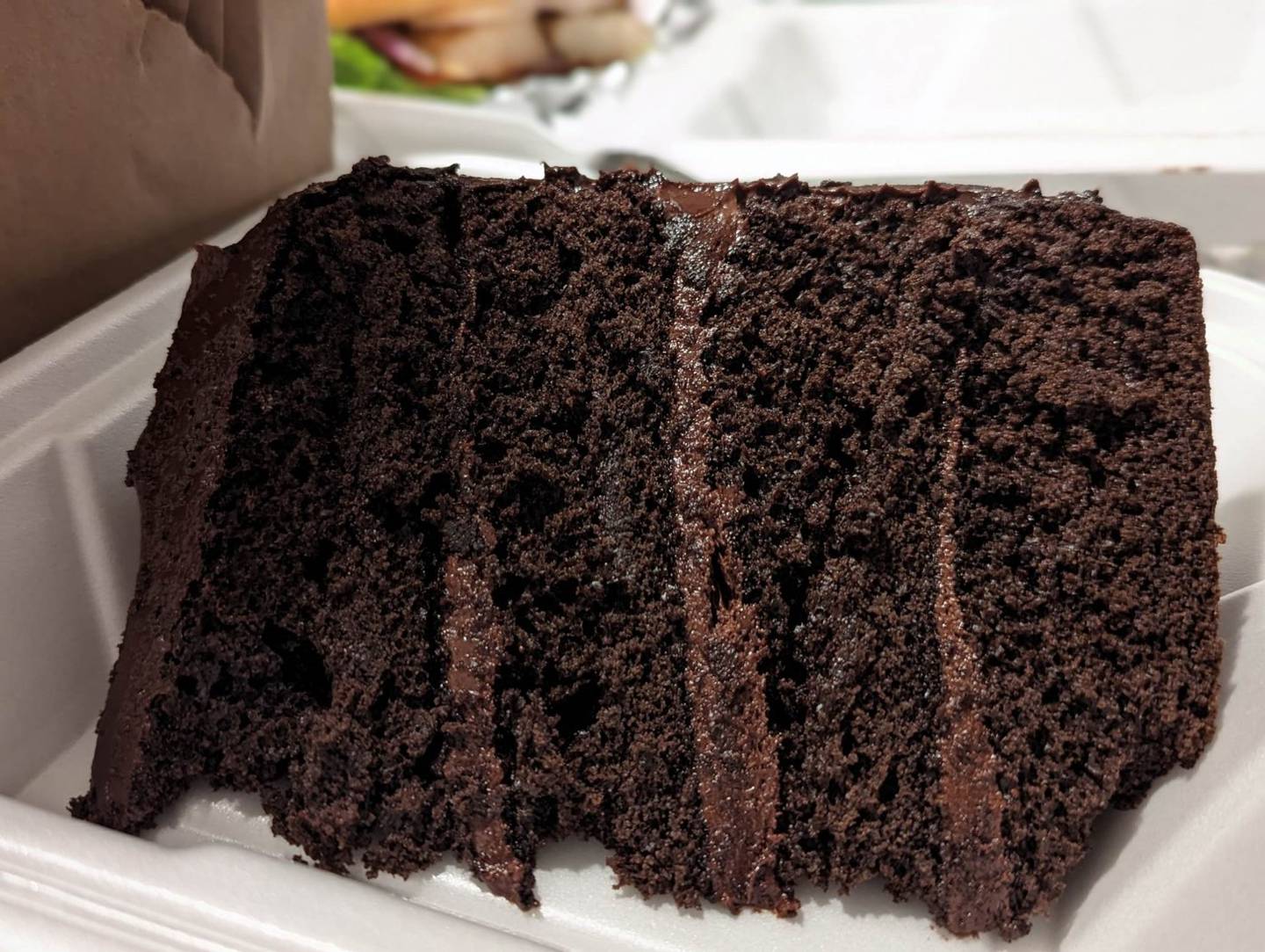 This slice of chocolate cake from Craft'd Plainfield is perfect for sharing with one or more friends.