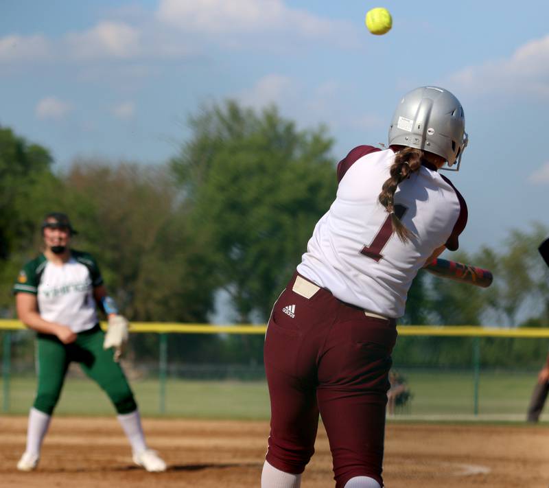 Marengo’s Gabby Christopher belts a home run against North Boone in IHSA Softball Class 2A Regional Championship action at Marengo Friday.