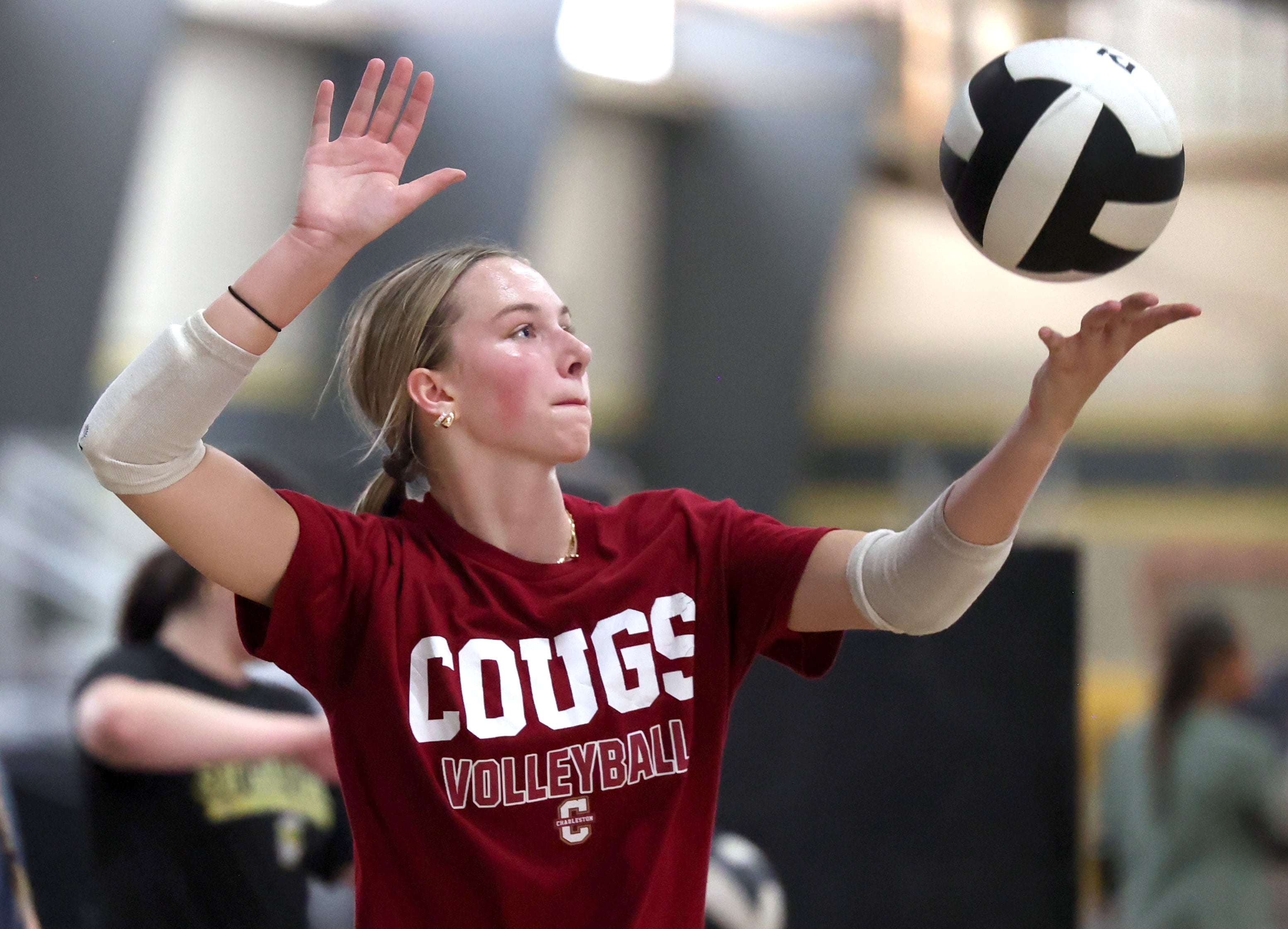 Ava Carpenter serves during a drill at Sycamore High School volleyball camp Tuesday, July 23, 2024, at Sycamore High School.