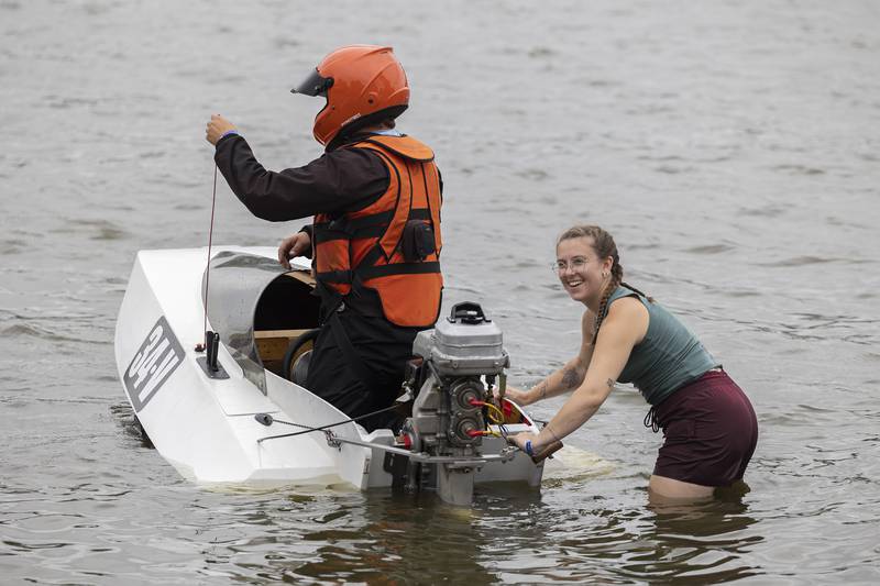 Lauren Hagelstein of DeKalb prepares to pull start racer Holden Mackey’s race boat Saturday, August 26, 2023 in Rock Falls.