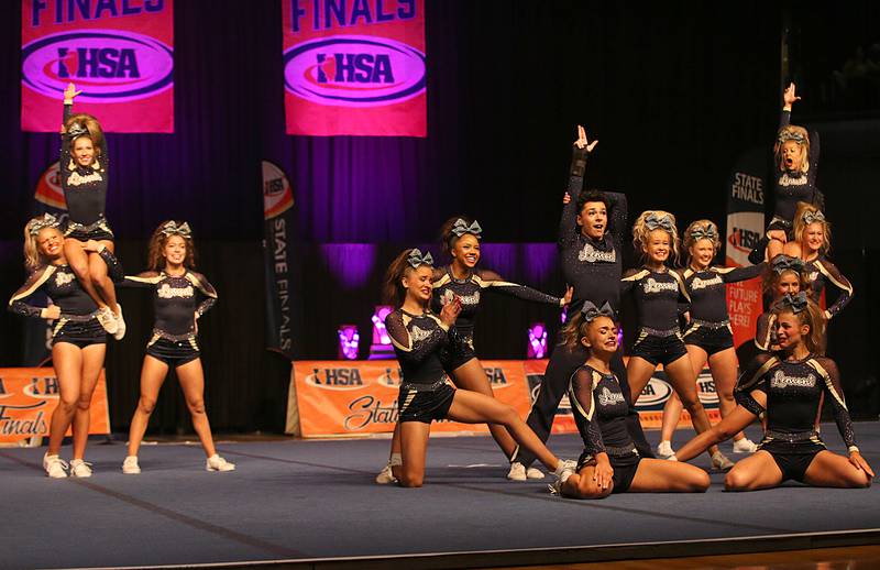 Members of the Lemont cheer team perform during the IHSA Cheer State Finals in Grossinger Motors Arena on Saturday, Feb. 4, 2023 in Bloomington.