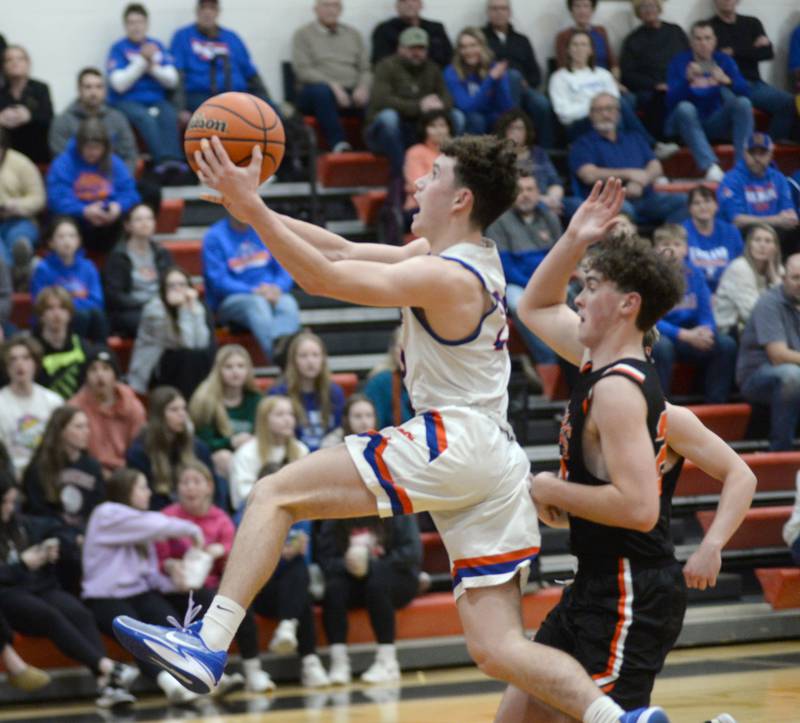 Eastland's Peyton Spears (20) drives toward the basket for a layup on Wednesday, Feb. 21, 2024 against Milledgeville at the 1A Forreston Regional at Forreston High School.