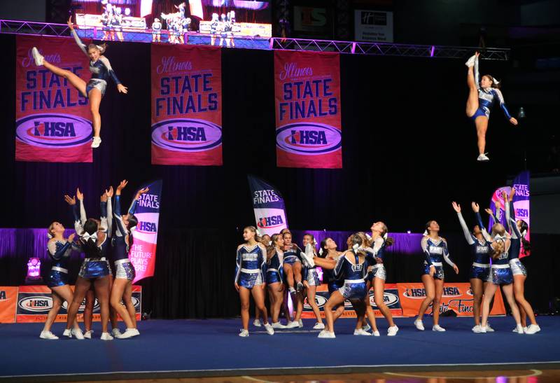 Members of the Lincoln Way East cheerleading team perform during the Competitive Cheerleading State Finals on Saturday, Feb. 3, 2024 at Grossinger Motors Arena in Bloomington.