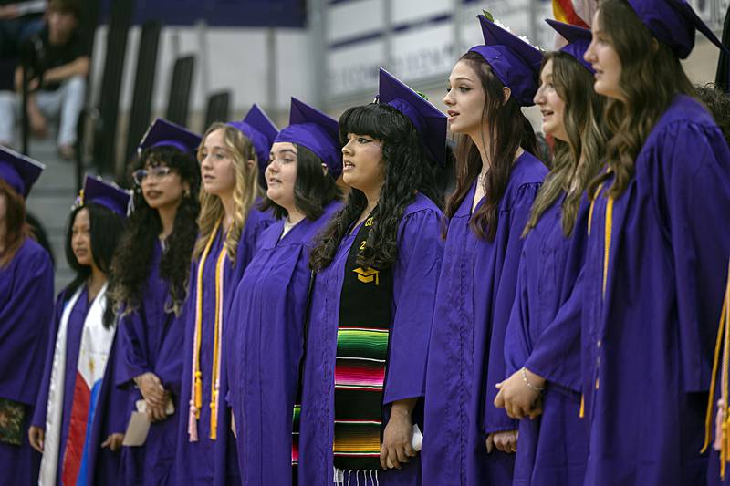 Senior choir members sing “Million Dreams” Sunday, May 26, 2024 at the start of Dixon High School’s commencement.