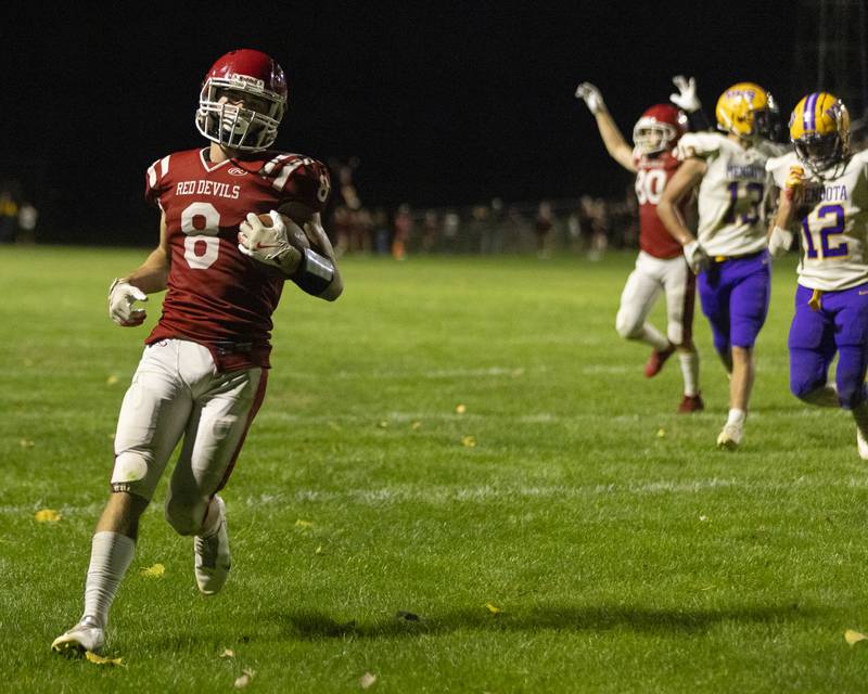 Braden Curran of Hall High School runs a successful pass into endzone for a touchdown against Mendota High School during the game at Richard Nesti Stadium on September 13, 2024.