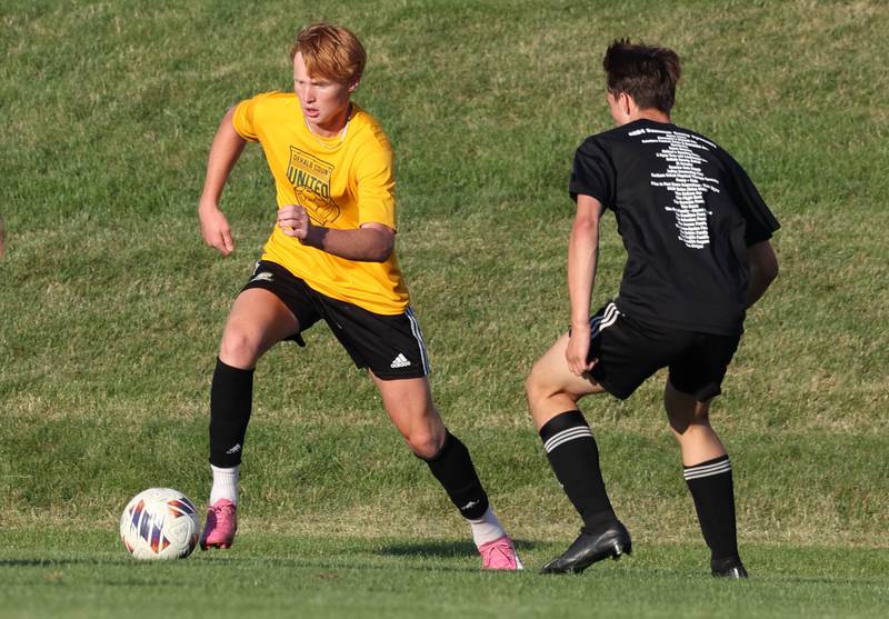 Sycamore’s Jameson Carl tries to get by a DeKalb player Wednesday, July 17, 2024, during their scrimmage game at Sycamore High School.