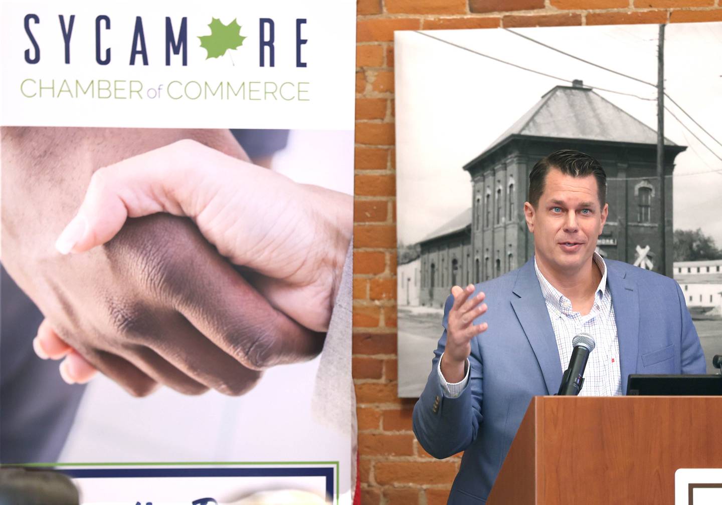 Brian Gregory, DeKalb County administrator, speaks Wednesday, May 1, 2024, at the Sycamore Chamber of Commerce State of the Community Address in the DeKalb County Community Foundation Freight Room.