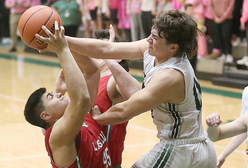 L-P's Andy Medina grabs a rebound over St. Bede's Nathan Husser on Wednesday, Feb. 14, 2024 at St. Bede Academy.