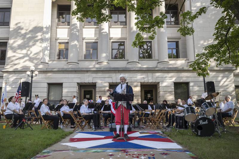 Tom Wadsworth, channeling Declaration of Independence author Thomas Jefferson, reads the historic document Friday, July 5, 2024 on the lawn of the Old Lee County Courthouse.