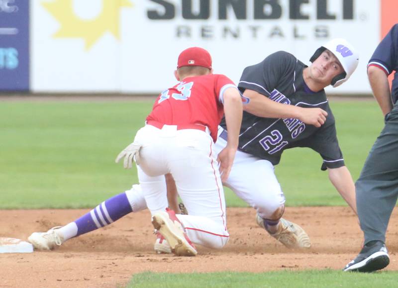 St. Anthony's Sam Link tags out Wilmington's Lucas Rink trying to steal second base during the Class 2A State semifinal game on Friday, May 31, 2024 at Dozer Park in Peoria.