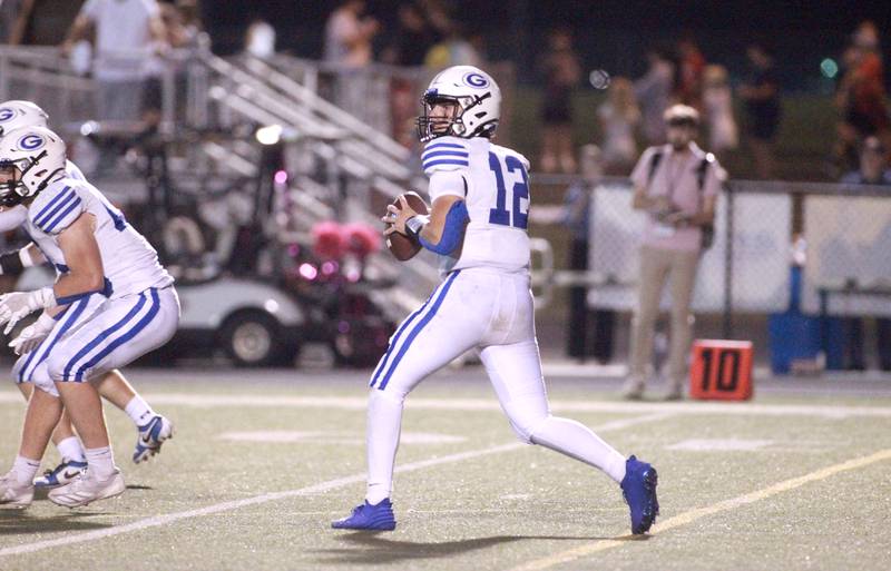 Geneva quarterback Anthony Chahino looks to throw the ball during a game against Wheaton Warrenville South Friday, Sept. 13, 2024 in Wheaton.