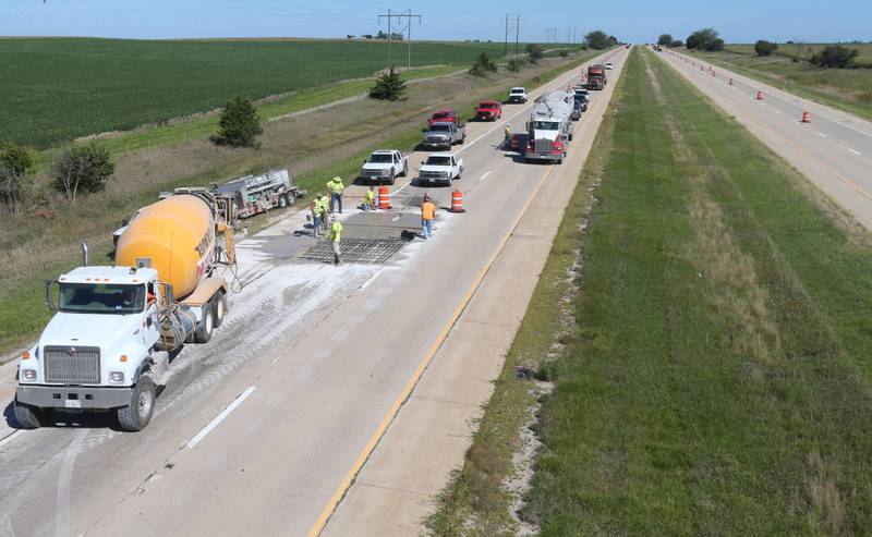 Crews pour a section of concrete Tuesday, Sept. 3, 2024, while doing patch work on Interstate 39 between Lostant and Tonica. The Illinois Department of Transportation will be do joint and pothole repair through November. Motorists are asked to use caution and expect delays when traveling through the work zones. The project is part of the Rebuild Illinois investing $33.2 billion into all modes of transportation across the state.