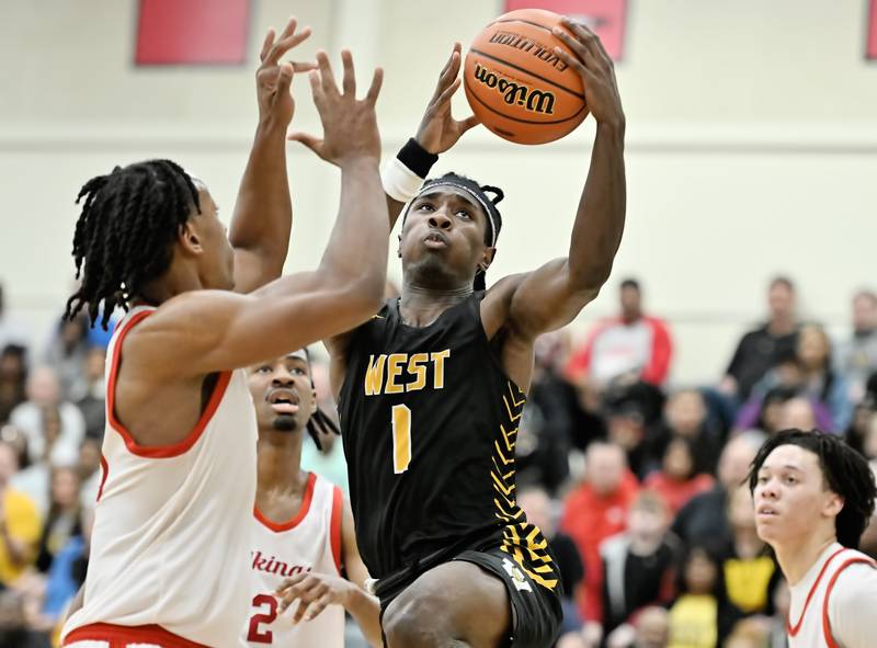 Joliet West's Justus Mcnair goes up strong for a shot during the Class 4A sectional semifinal Homewood Flossmoor at Rich Township on Tuesday, Feb. 27, 2024, at Richton Park. (Dean Reid for Shaw Local News Network)