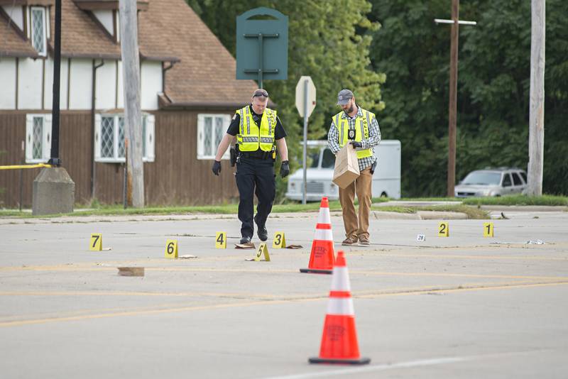 Investigators work at the scene of a fatal incident at the 1200 block of Palmyra Saturday, Sept. 24, 2022 in Dixon.