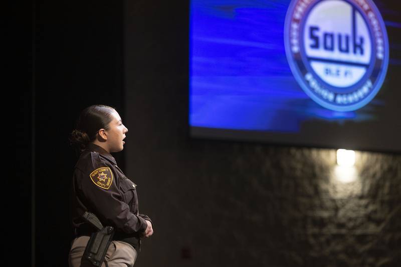 SVCC Police Academy graduate Stephanie Martinez sings the National Anthem Friday, April 14, 2023 at the start of the graduation ceremony.