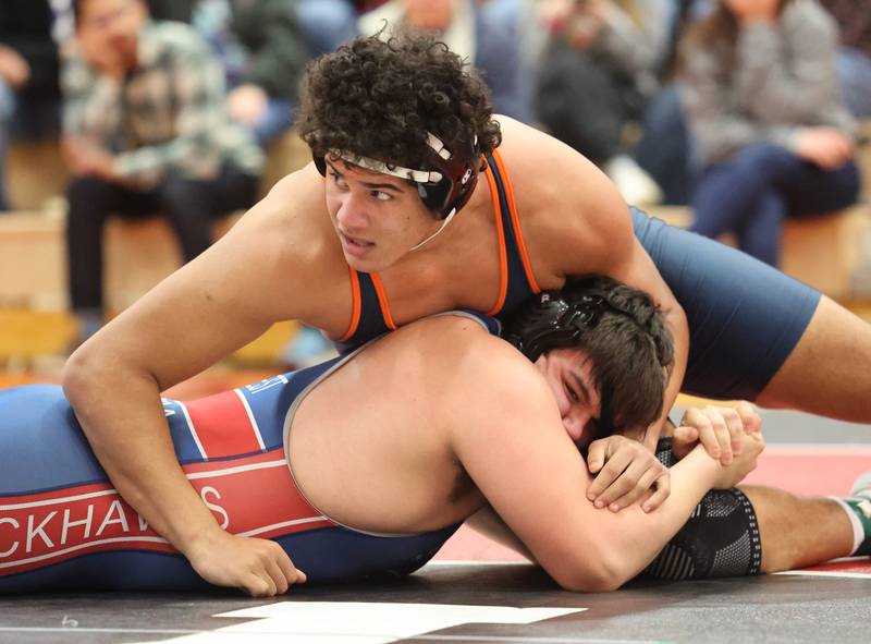 West Aurora's Johnston goes up against against Romeoville's Gallaway during the Southwest Prairie Conference wrestling meet at Yorkville High School on Saturday, Jan. 21, 2023.