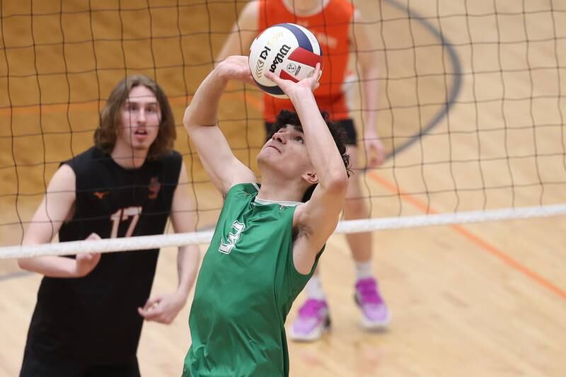 Providence’s Nico Krabbe sets the ball against Lincoln-Way West on Wednesday, April 3, 2024 in New Lenox.