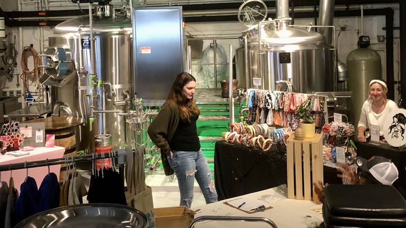 Vendors showcased handmade goods inside Fox Republic Brewing Co. during the Sips and Sunshine Makers Market event on June 1, 2024, in downtown Yorkville.