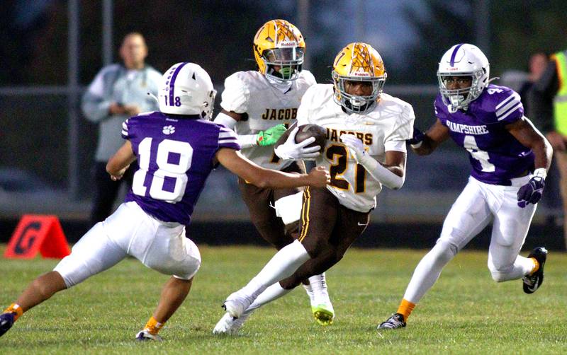 Jacobs’  Mike Cannady runs the ball in varsity football on Friday, Sept. 6, 2024, at Hampshire School in Hampshire.