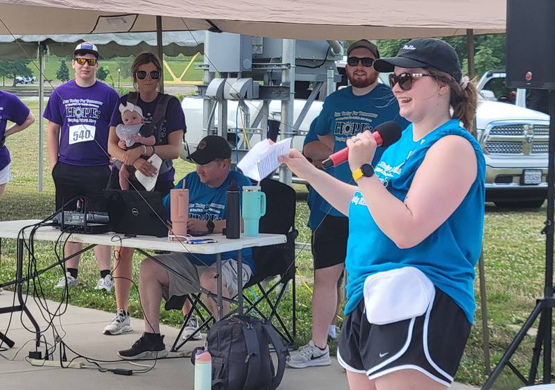 Run Today For Tomorrow director Emily Hardee addresses the crowd at Saturday morning's 5K run/walk for suicide awareness.