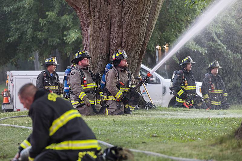 Firefighters battle a house fire Wednesday, June 26, 2024 at 1501 First Avenue in Sterling. Multiple departments responded to the scene including Sterling, Rock Falls, Dixon, Amboy, Morrison and Prophetstown.