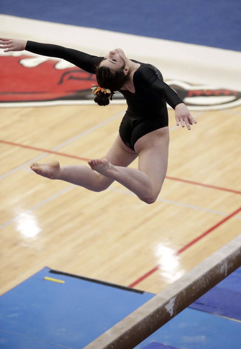 DeKalb’s Annabella Simpson competes on the Balance Beam during the IHSA Girls Gymnastics State Finals Saturday February 19, 2022 at Palatine High School.