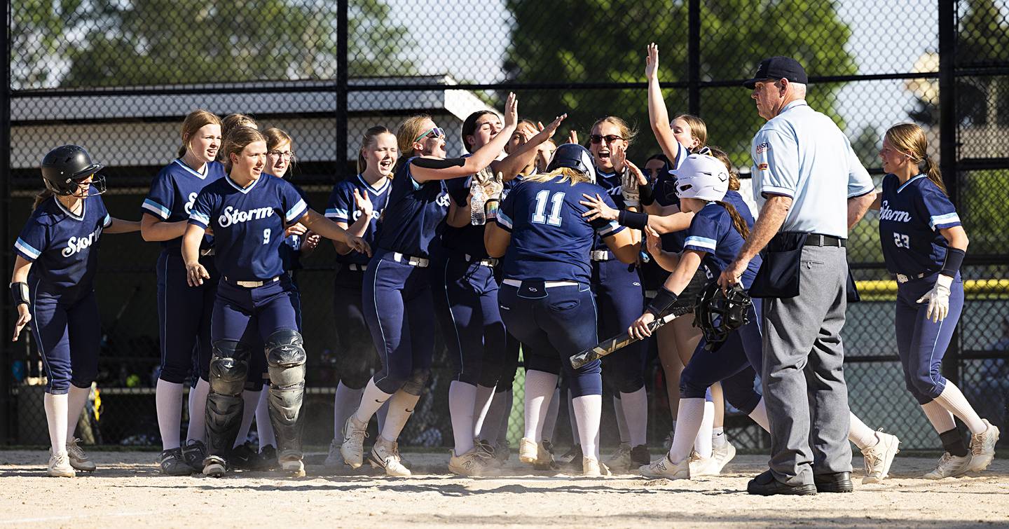 Bureau Valley celebrates Emma Stull’s home run against Princeton Friday, May 17, 2024 at the Class 2A regional semifinals in Rock Falls.