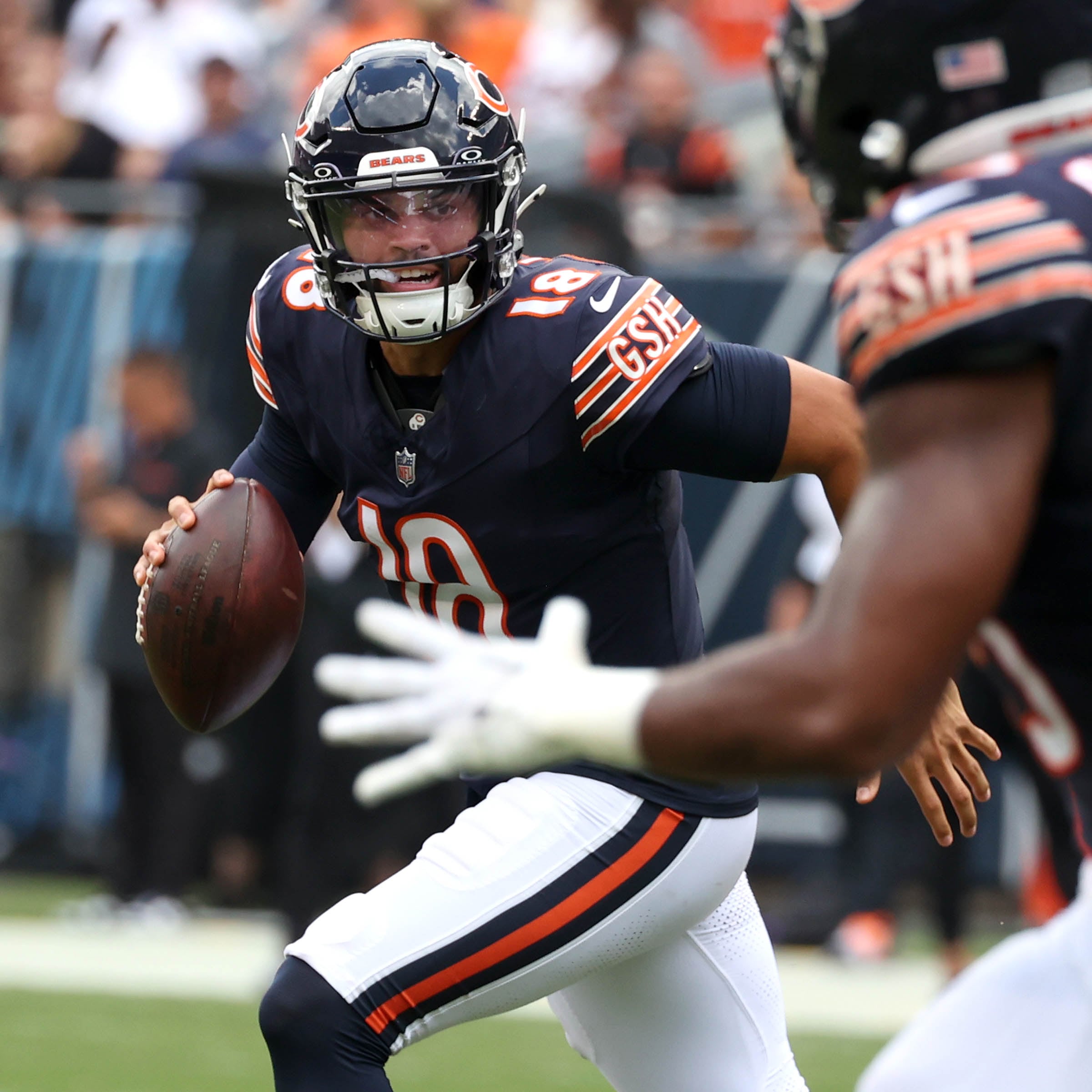 Chicago Bears quarterback Caleb Williams looks to throw a pass to Chicago Bears fullback Khari Blasingame during their game against the Cincinnati Bengals Saturday, Aug. 17, 2024, at Soldier Field in Chicago.