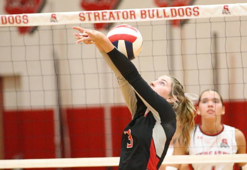 Woodland's Malayna Pitte hits the ball against Streator on Monday, Aug. 26, 2024 at Streator High School.