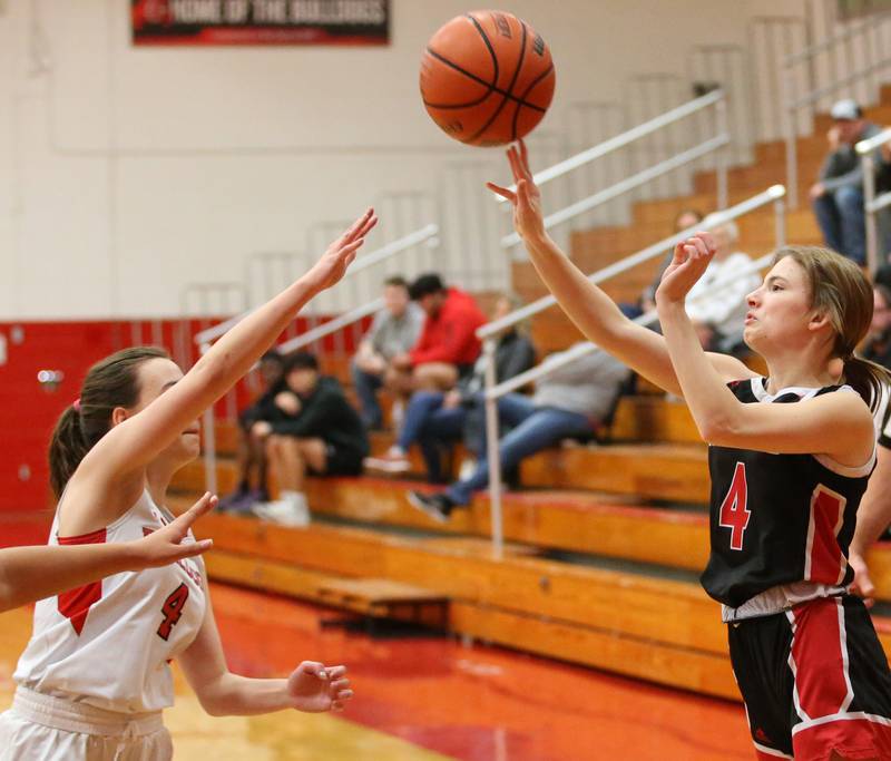 Henry-Senachwine's Mikalya Frawley (right) shoots a jump shot over Streator's Kora Lane (left) on Wednesday, Jan,. 4, 2023 at Streator High School.