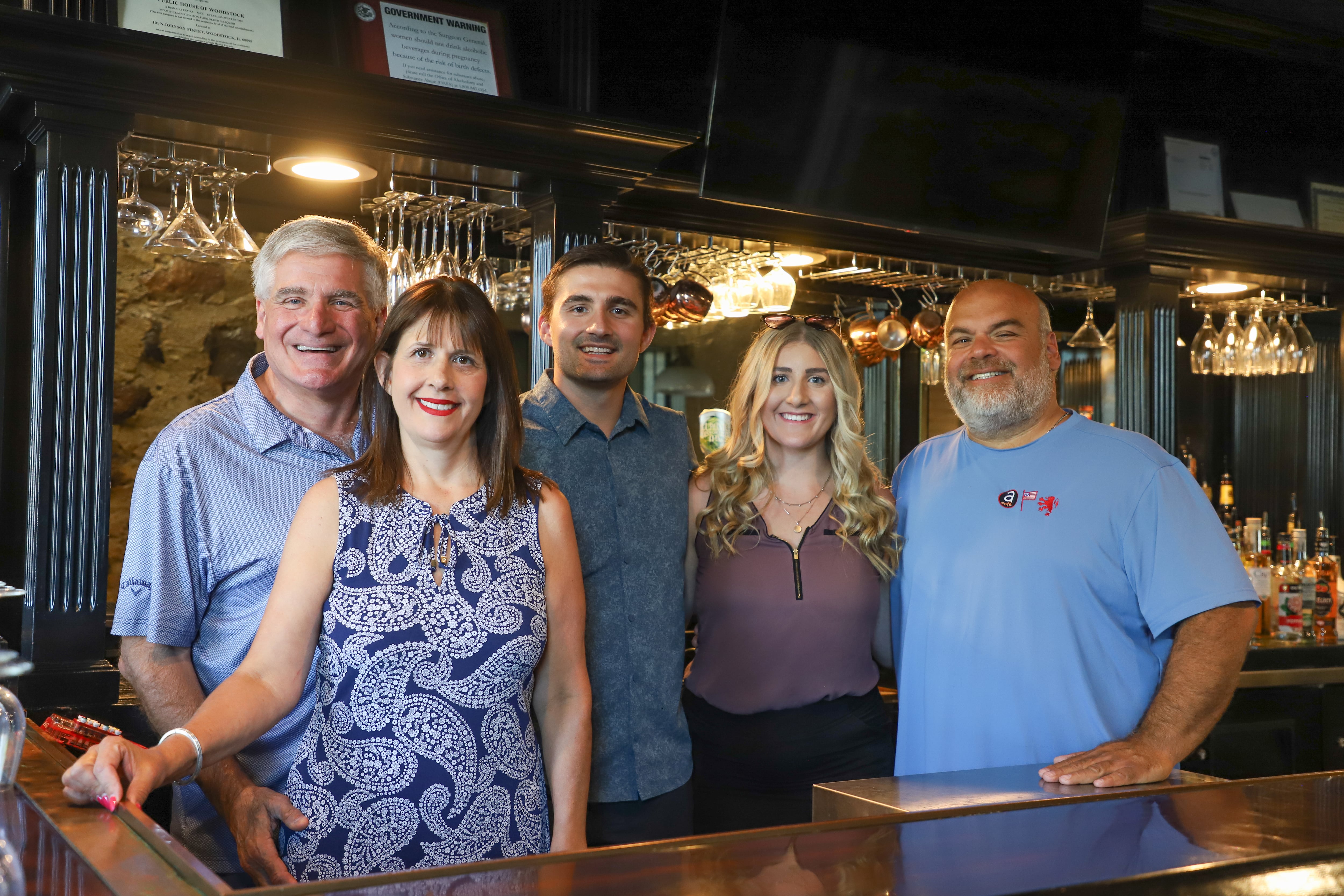 Bill Linardos, Tammy Linardos, William Linardos, Sophia Linardos and Bob Karas will operate Squire on the Square in Woodstock.