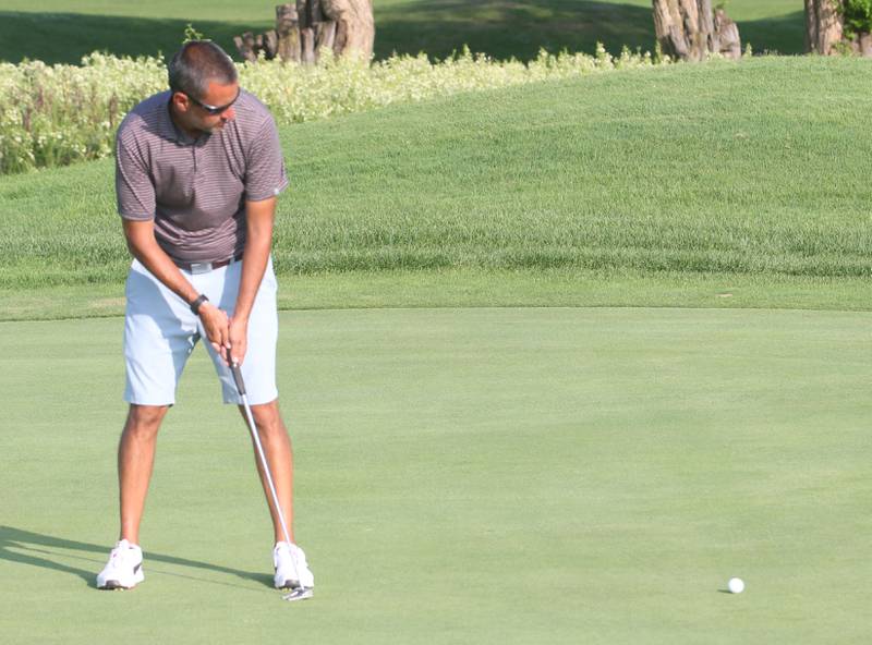 TJ Templeton putts on the 17th hole during the Illinois Valley Men's Golf Championship on Sunday, July 28. 2024 at Mendota Golf Club.